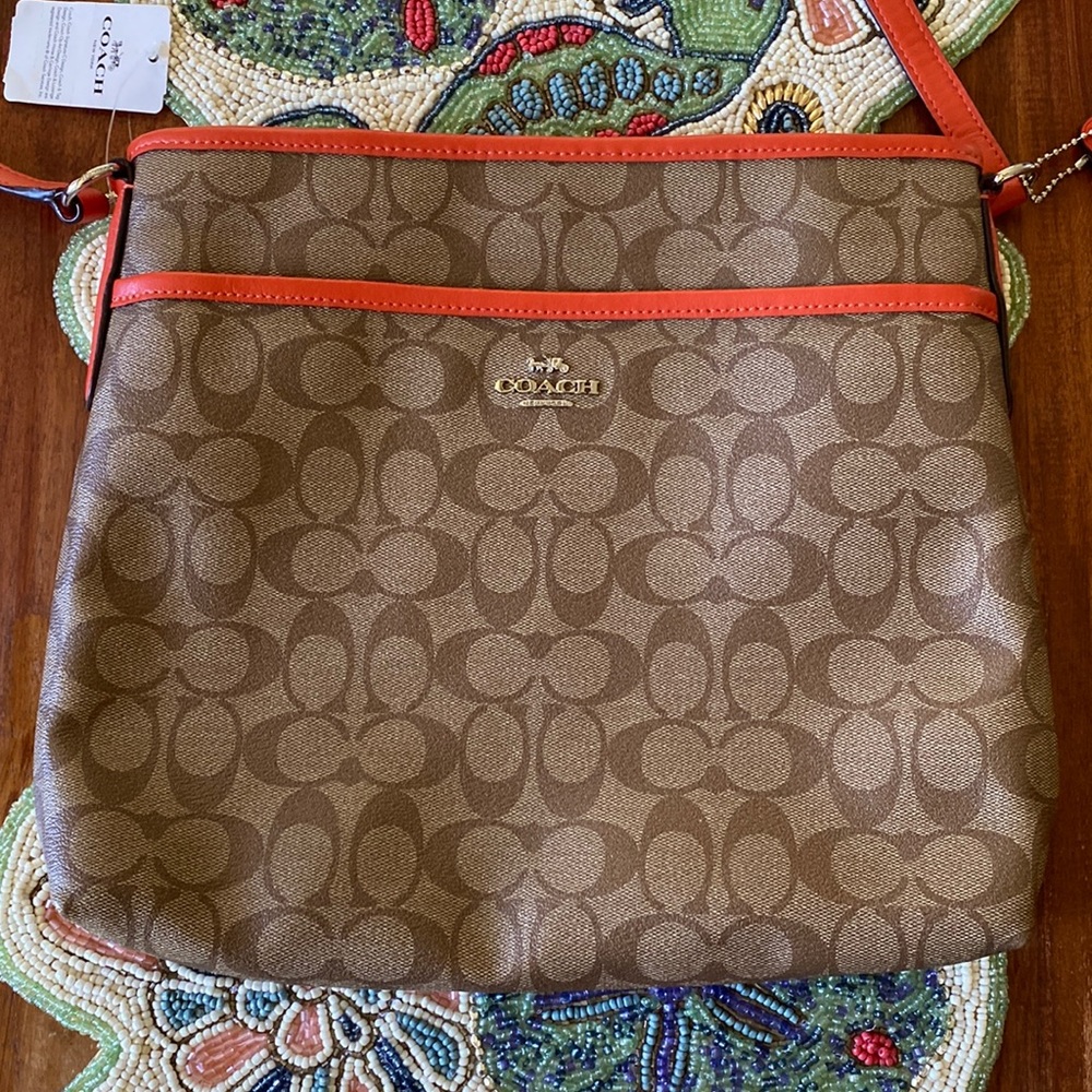 Coach Brown/Coral Orange Signature Canvas and Leather Swingpack Bag